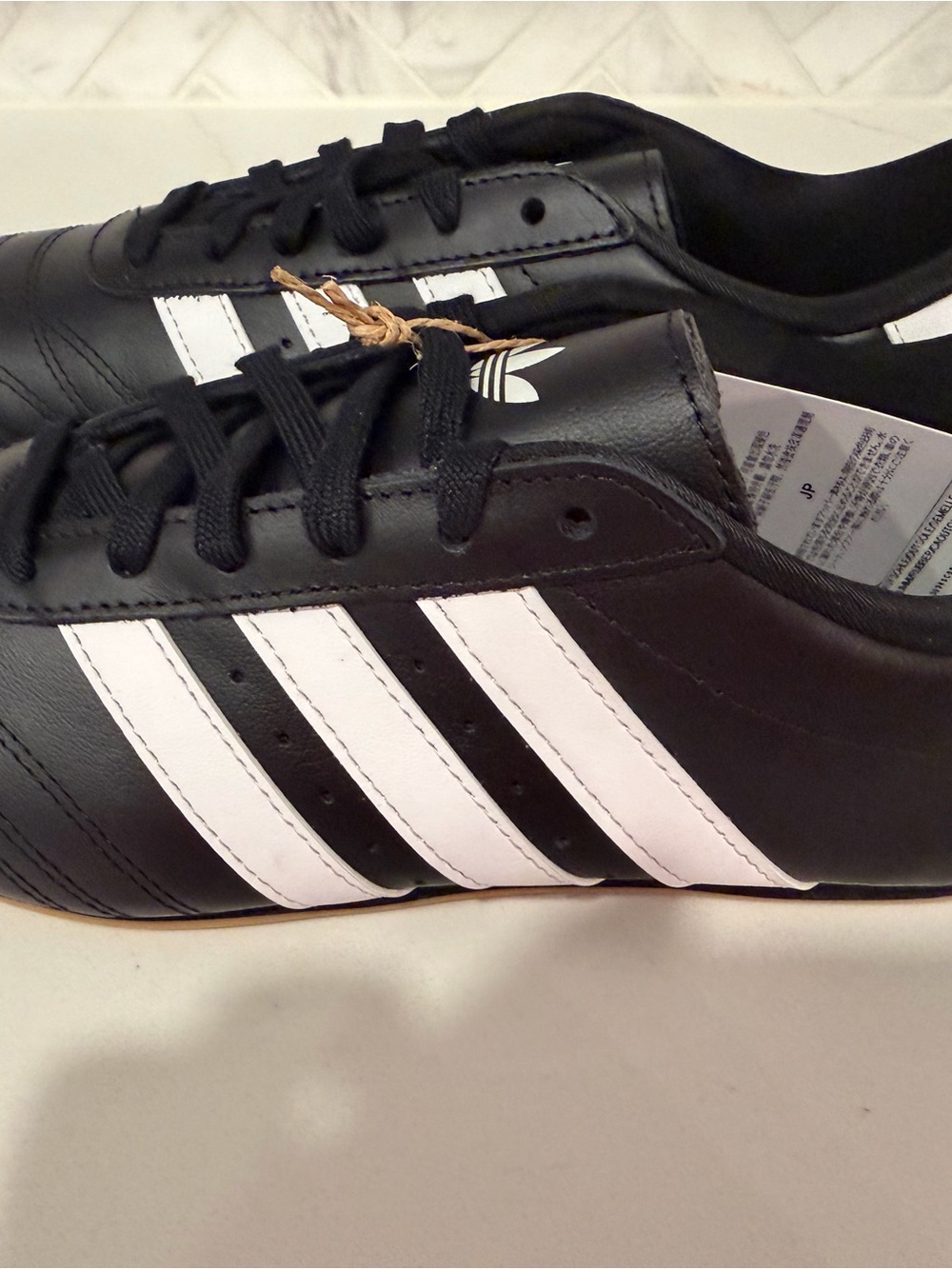 adidas Black and White Low-Profile Sneaker
